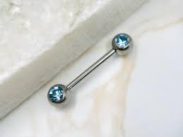 Colored Ball Nipple Piercings